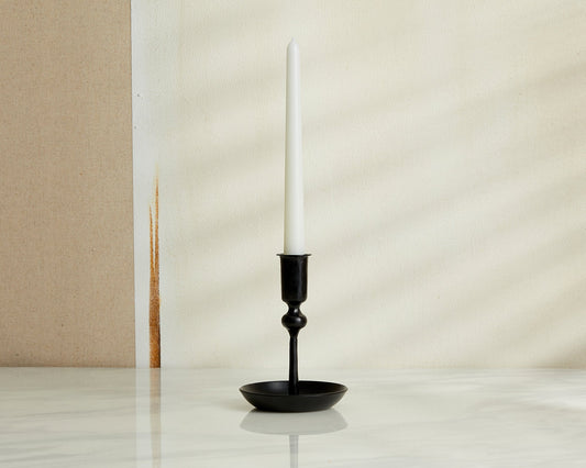 Forge Ember iron candle holder matte black forge inspired accent styled on marble table top
