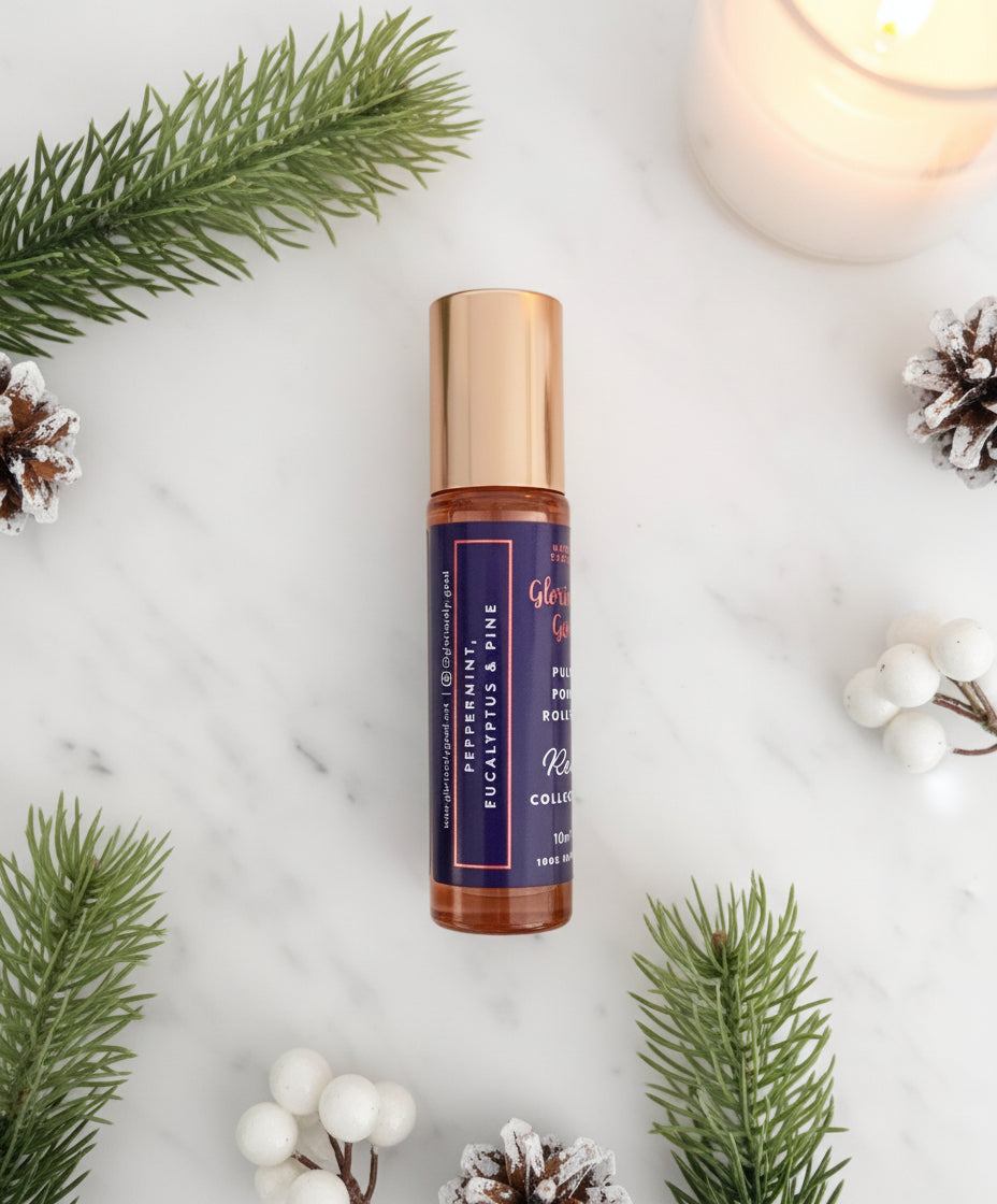 Side view of peppermint eucalyptus pine roll-on Christmas aromatherapy gift with festive sprigs
