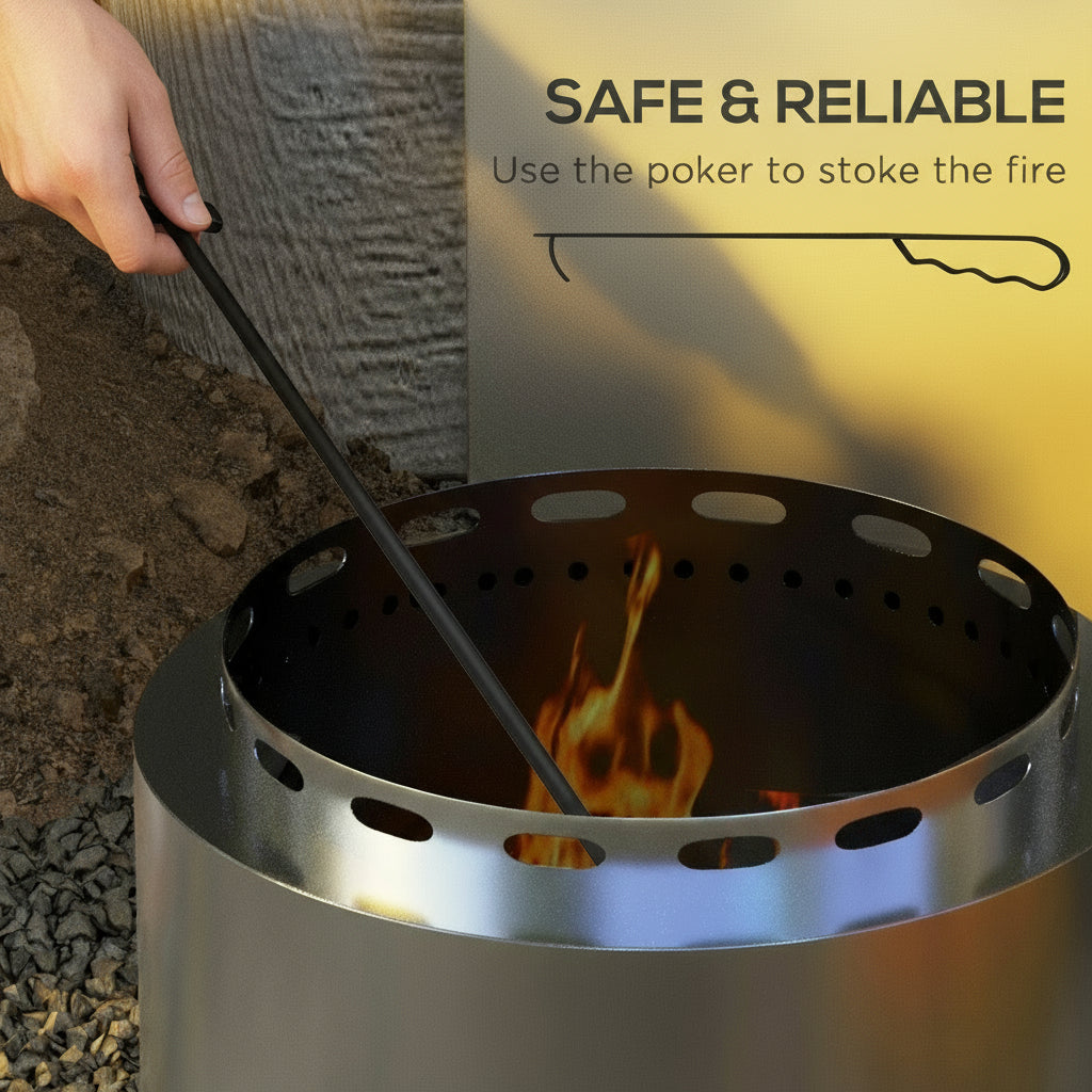 Hand using a poker to stoke fire in 48.5cm smokeless stainless steel fire pit, silver garden design for safe and soulful outdoor warmth