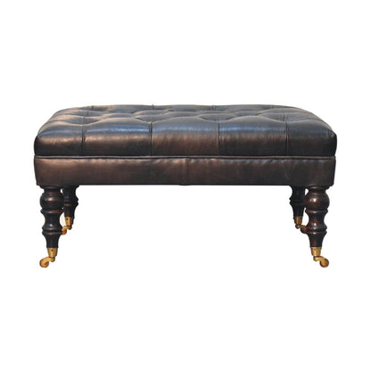 The Edgcumbe Ottoman – Ash Black Buffalo Hide & Castor - Leg Seat - The Timeless Trading Co.