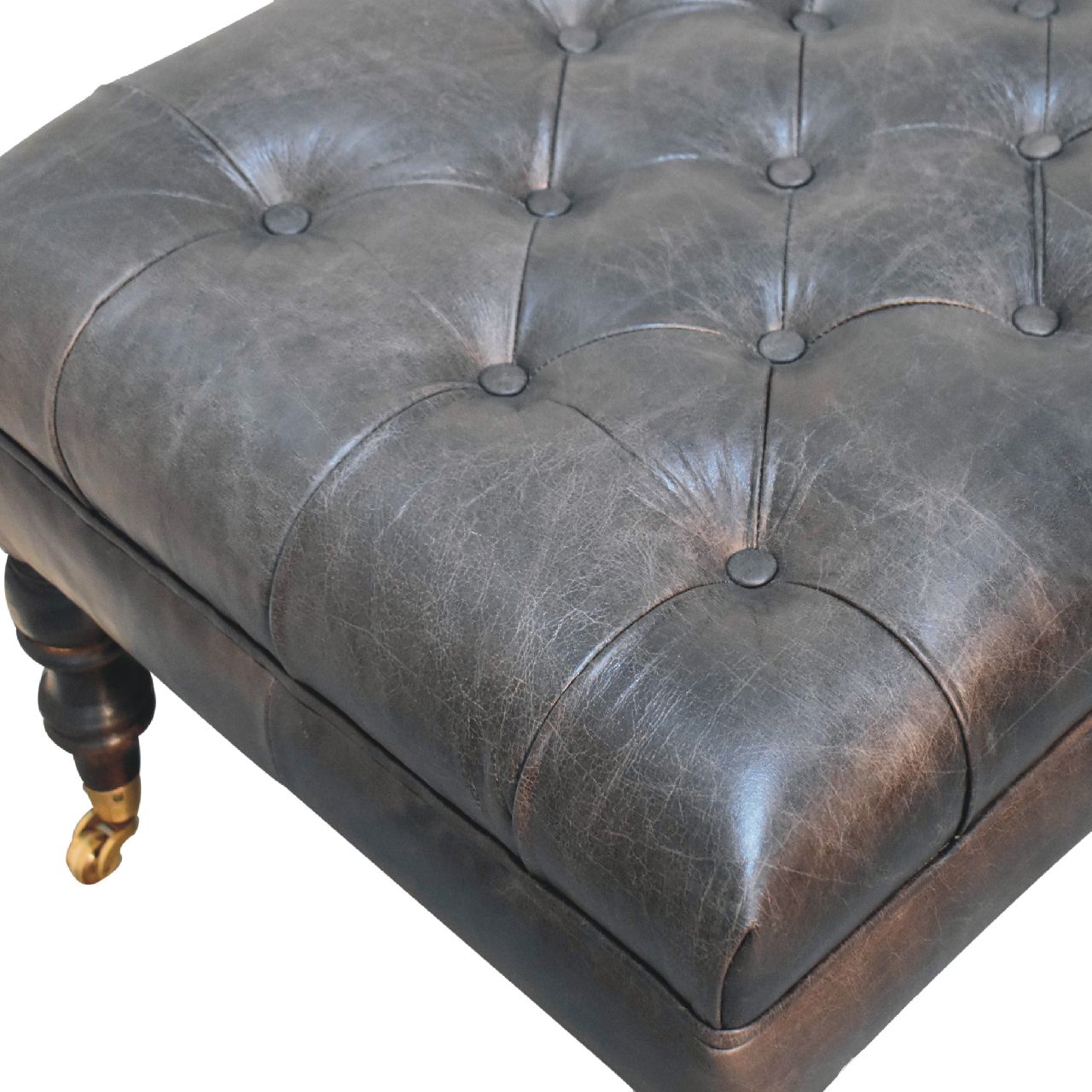 The Edgcumbe Ottoman – Ash Black Buffalo Hide & Castor - Leg Seat - The Timeless Trading Co.