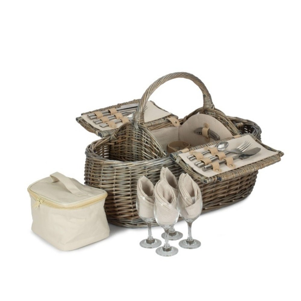 4 person boat-shaped wicker picnic basket with fitted interior — handwoven hamper styled for countryside gatherings and timeless outdoor rituals