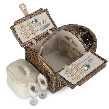 Boat-shaped wicker picnic basket with fitted interior — handwoven hamper styled for countryside walks, dockside lunches, and timeless outdoor rituals