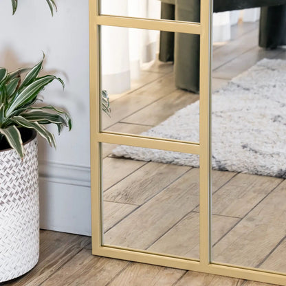 Bottom corner of gold arched lattice mirror — 180cm x 90cm frame with antique-style metal finish and countryside-inspired detailing