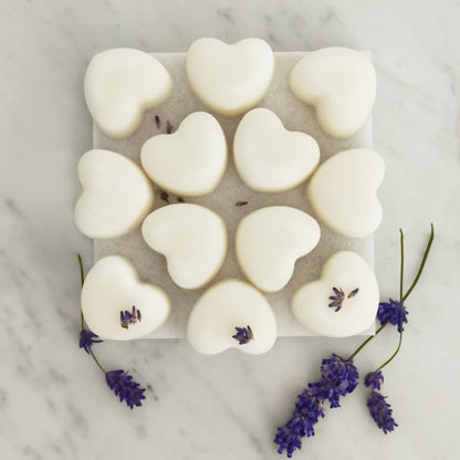 Twelve lavender ylang ylang wax melts displayed on table for festive aromatherapy gift
