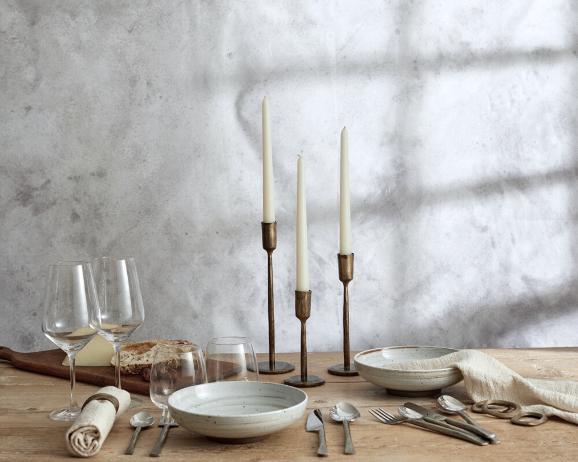 Weldon iron candle holder set rustic taper holders all three sizes styled on dinner table setting
