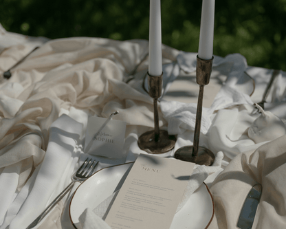 Weldon iron candle holder set rustic taper holders all three sizes styled on wedding table place setting
