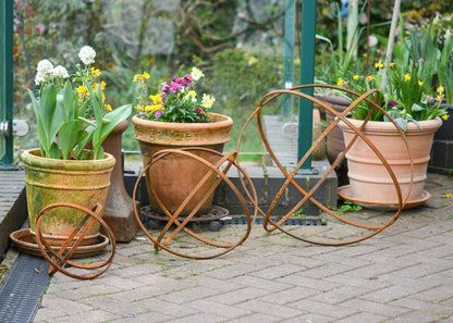 Whispering Garden Sphere Trio – Rusted Steel Sculptures - The Timeless Trading Co.